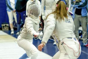  Peachtree City native Lena Johnson (R) lunges for a point in a fencing match at the Ivy League Championships in February. Photo/Mike McLaughlin.