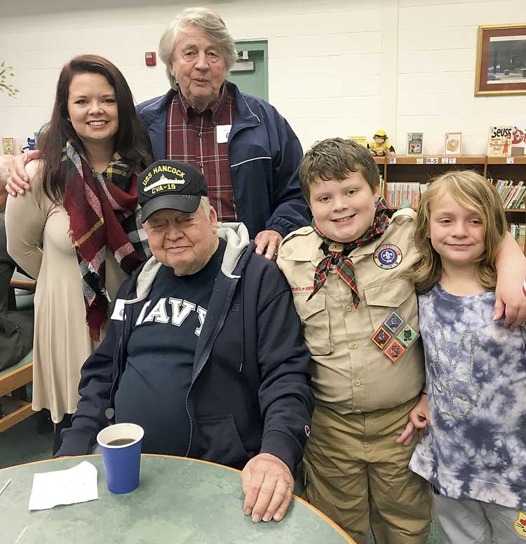 Below, from left, Jessica Faulkner, Alvin Parker, Dale Andrews, Carson and Caroline Moses pose for a photo in the school library. Photo/Jessica Faulkner.
