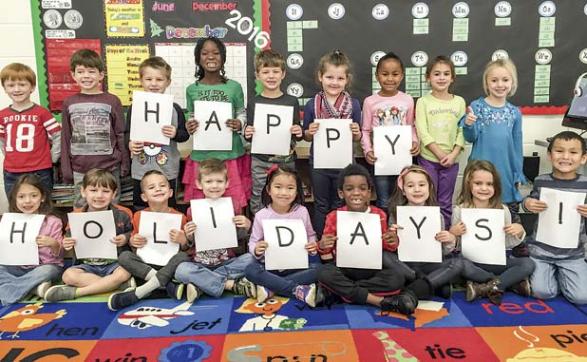  It’s easy to spell and easy to tell that the Christmas holiday is here. These cheery kindergarten kids above, with maybe only a bit of help from teacher Diedre Glass at Huddleston Elementary School, were all about the holidays. Photo/Submitted.