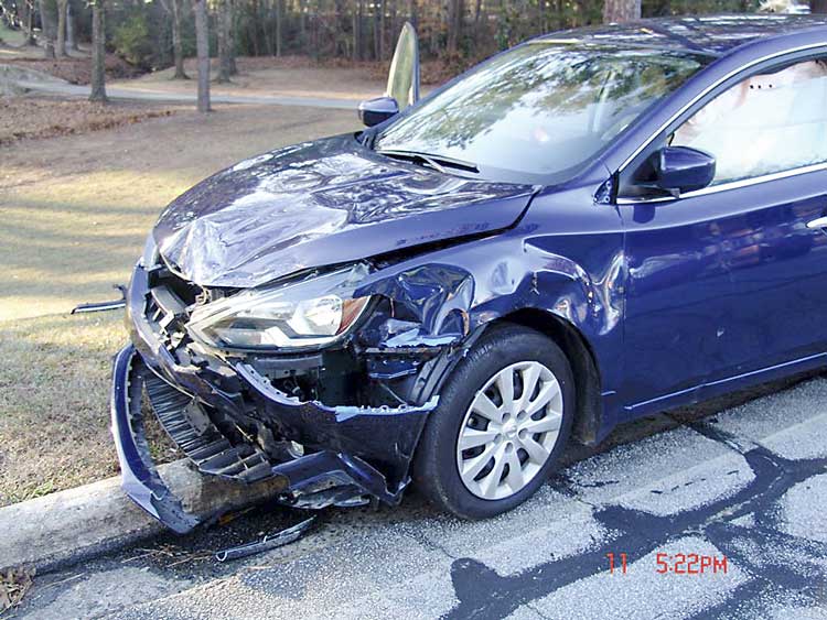 In Peachtree City, golf cart collides with car; ...