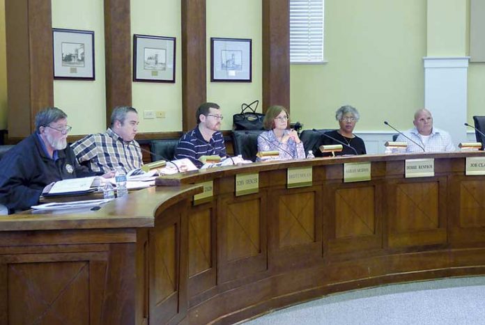 Members of the Fayetteville Planning and Zoning Commission include, from left, commissioners Ken Collins, Toby Spencer, Brett Nolan, Chairman Sarah Murphy and commissioners Debi Renfroe and Joe Clark. Photo/Ben Nelms.