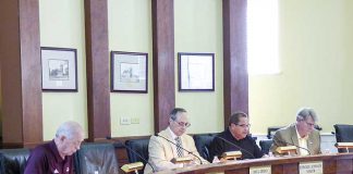 Members of the Fayetteville City Council at the May 30 meeting include, from left, councilmen Harlan Shirley and Paul Oddo, Mayor Ed Johnson and Councilman Rich Hoffman. Photo/Ben Nelms.