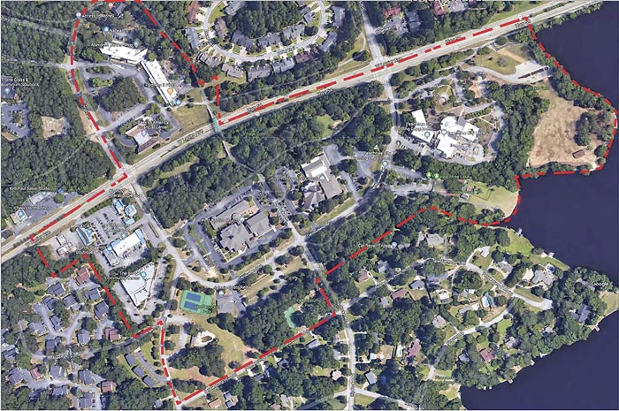 In aerial map above, red dotted line shows proposed area along Ga. Highway 54 that would be a potential redeveloped city center. Graphic/Peachtree City.