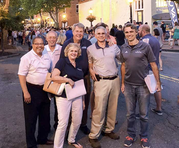 Fayetteville officials recently visited Roswell to get a look at downtown development offerings and the crowds those developments could draw. Pictured, from left, are Mayor Ed Johnson, Councilman Harlan Shirley, Councilman Rich Hoffman, Fire Chief and Assistant City Manager Alan Jones and Downtown Development Director Brian Wismer. And, at center, Councilwoman Kathaleen Brewer. Photo/Submitted.