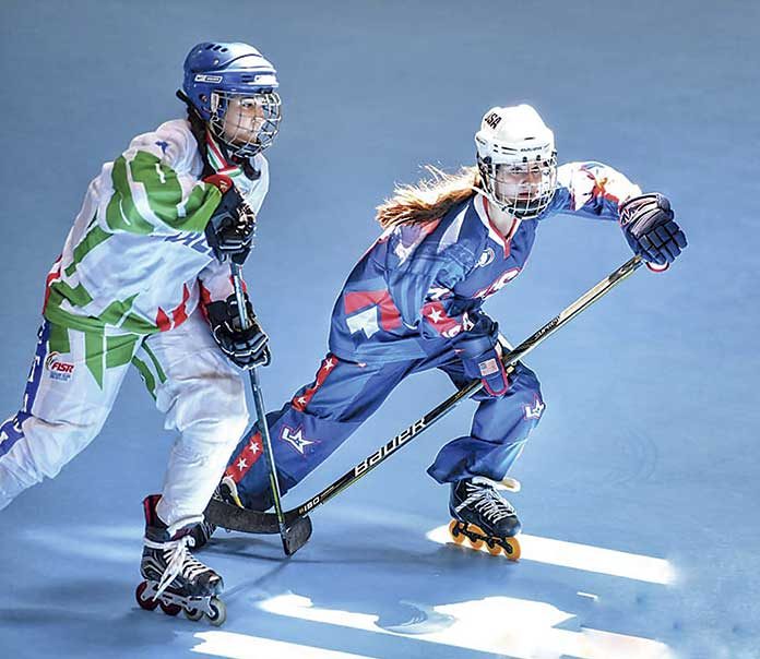 Cami Salaski, (blue jersey on the right) from Peachtree City, just returned from Barcelona, Spain and the World Roller Championship  for Team USA. Photo/Shanley Salaski.