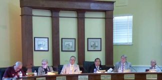 Members of the Fayetteville City Council at the Sept. 19 meeting were, from left, council members Harlan Shirley, Kathaleen Brewer and Paul Oddo, Mayor Ed Johnson and council members Rich Hoffman and Scott Stacy. Photo/Ben Nelms.