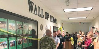 The McIntosh High School Wall of Honor honoring former students, faculty and staff who served in the military was unveiled on Sept. 6 before a wealth of visitors. Photo/Ben Nelms.