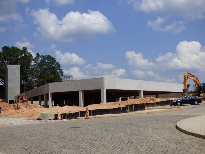 Recognize this structure? It’s the parking deck which will be situated inside the outline of one of the three commercial and residential buildings in the Town Center portion of Pinewood Forest in Fayetteville. Photo/Ben Nelms.