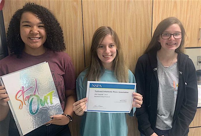 2020 Legend editors Jaylen Smith (12), with a copy of the 2019 book; Rachel Edge (12), holding the NSPA award; and Natalie Spellman (10). Photo by Landon Wilde.