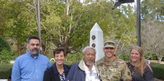 Captain Guy Serapion was joined by his family on Oct. 18 as he was recognized by local veterans organizations at the Veterans Memorial in Peachtree City. Pictured, from left, are brother Chad, mom Barbara, dad Ben, Guy and wife Nicole. Photo/Ben Nelms.