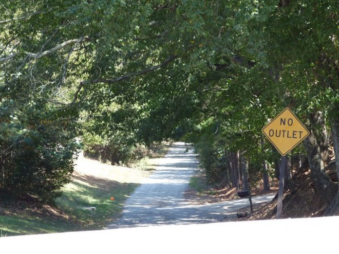 Photo shows a portion of Stagecoach Road seen from its intersection with Robinson Road. Photo/Ben Nelms.