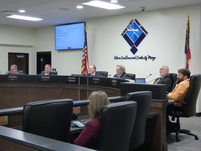 The Fayette County Board of Education on Nov. 4 voted 4-1 to build a $46 million replacement school for Booth Middle School in Peachtree City. Pictured, from left, are board members Brian Anderson and Barry Marchman, Superintendent Jody Barrow, Chairman Scott Hollowell, and board members Roy Rabold and Leonard Presberg. Photo/Ben Nelms.