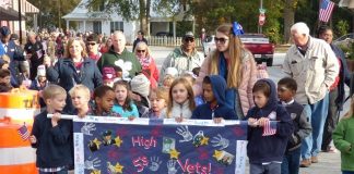 The students at Liberty Tech Charter School in Brooks made sure Veterans Day was a special event by holding a parade and live music downtown. Photo/Ben Nelms.