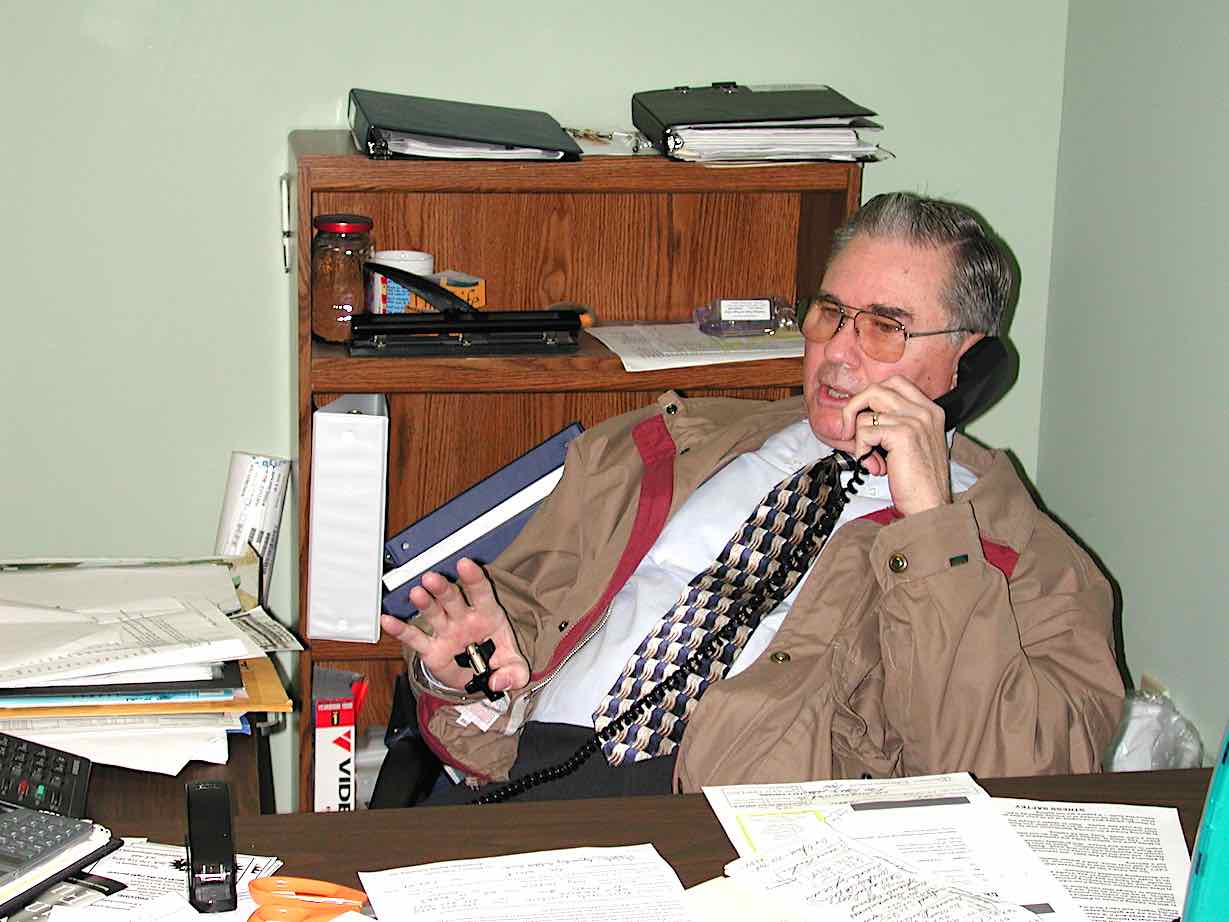 <b>Jack Wheeler at work as sales manager of The Citizen Newspapers, from his office in Fayetteville circa 2001.</b>