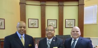 Sworn in on Jan. 9 were, from left, Fayetteville Councilman Darryl Langford, Mayor Ed Johnson and Councilman Joe Clark. Photo/Ben Nelms.