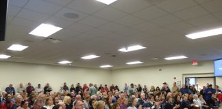 More than 200 people filled the meeting room at the Feb. 24 meeting of the Fayette County Board of Education. The vast majority opposed the proposed change to sex education curriculum. Photo/Ben Nelms.