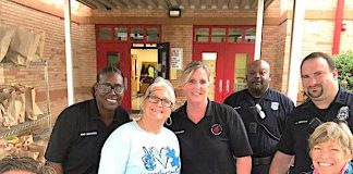 Spring Hill Elementary School staff and helpers prepare to distribute meals. Photo/Spring Hill Elementary School Facebook page.