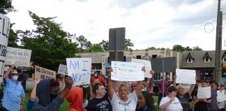 More than 200 people filled the sidewalks on both sides of Glynn Street in downtown Fayetteville on June 5, protesting the death of black lives at the hands of law enforcement. Met with the honking of hundreds of horns from passing vehicles showing solidarity, the group arrived at the site after holding a brief rally at the adjacent county complex. Photo/Ben Nelms.