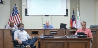 The Home2 Suites by Hilton hotel to be located off Ga. Highway 74 South and Crosstown Drive was approved June 8 by unanimous vote by the Peachtree City Planning Commission. Members at the meeting included, (in front, from left) Kenneth Hamner and Scott Ritenour and (in rear, from left) Commissioner Michael Link and Chairman Frank Destadio. Photo/Ben Nelms.