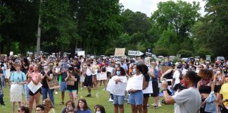 The photo above shows a portion of the group of 600 people who arrived at Drake Field in Peachtree City on June 7 to attend a protest initiated by McIntosh High School rising sophomore Kaitlyn Hood. The aim of the protest was to bring awareness to the black lives lost in encounters with law enforcement. Photo/Ben Nelms.