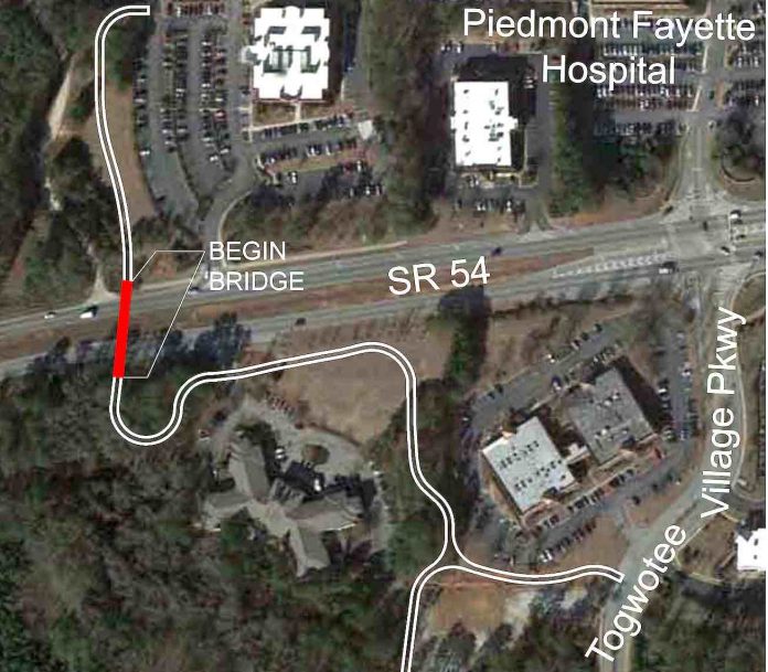 Aerial view of the route planned for the multi-use path and bridge across Ga. Highway 54 adjacent to the Piedmont Fayette Hospital. The path leads past Togwattee Village and connects to Bennett's Mill Middle School. Graphic/City of Fayetteville.