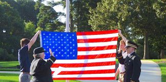 Nearly 100 people turned out July 10 to see Tyrone resident Connor Dial sworn-in as a 2nd Lieutenant by Lt. Col. Sharon Collins (Ret.) in an unofficial ceremony in Shamrock Park. Photo/Ben Nelms.