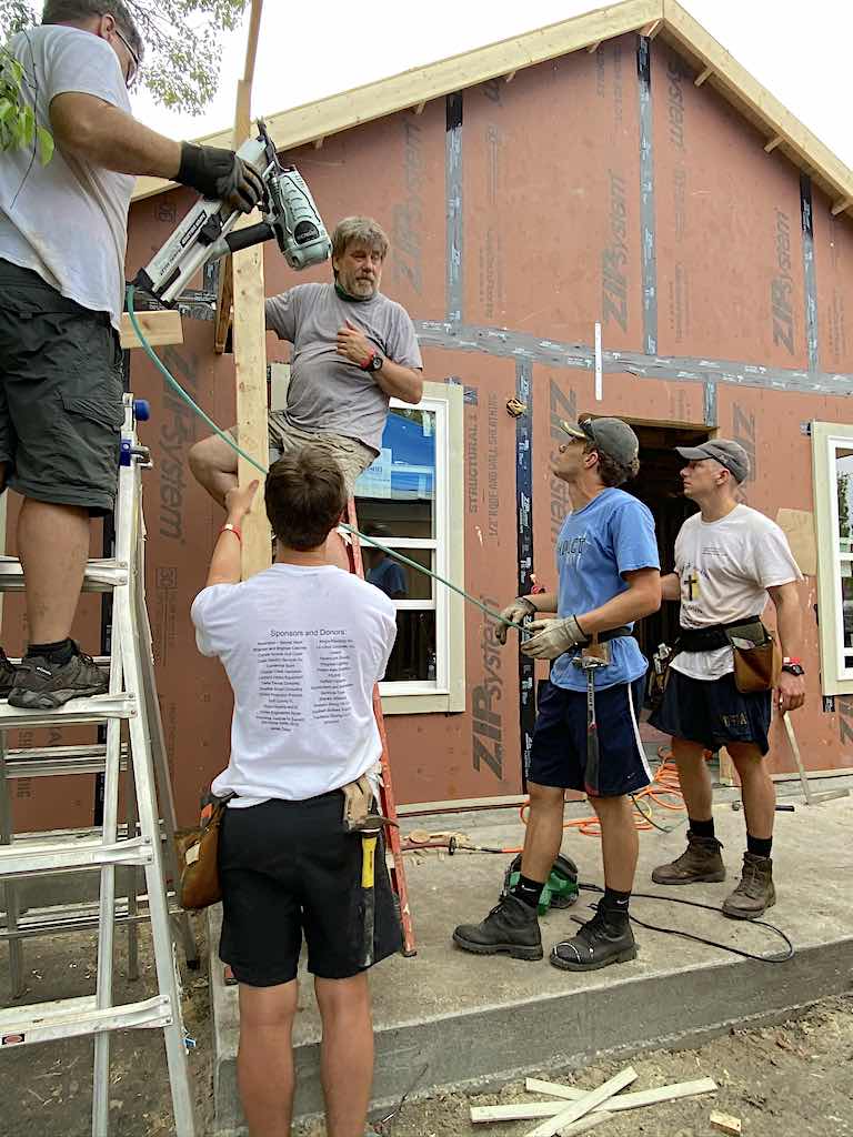 <b>The front of the house before the porch was put on. (L-R) Russ Eubanks, Wesley Aycock, Craig Wiley, Jacob Hartley, James Hartley.</b>