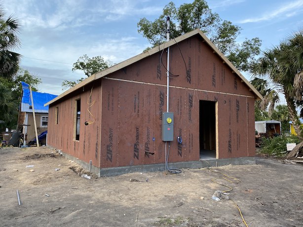 <b>The back of the house before we put the doors and windows in.</b>