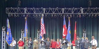 Members of local veterans' groups, along with the Fayette County Sheriff's Honor Guard, presented colors at the outset of the 9/11 tribute. Photo/Ben Nelms.