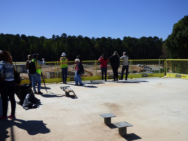 <b>A large deck on the second floor of the new Fayetteville City Hall, which will be open to the public, provides a great view of City Center Park and its many amenities. Photo/Ben Nelms.</b>