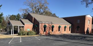 A discussion by the Tyrone Town Council led to the decision to explore having the former Town Hall building on Senoia Road to serve as a museum and as a location for events or historical archives. Before it was a town hall, the building housed a United Methodist Church. The church cemetery still flanks the building. Photo/Ben Nelms.