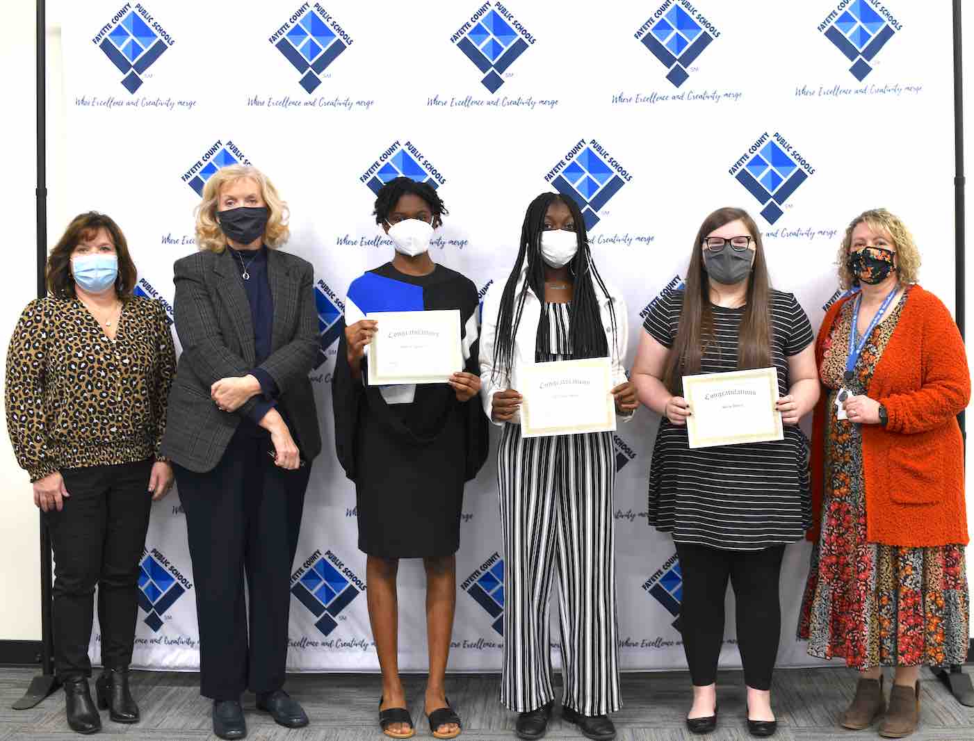 <b>(L-R) Whitewater Middle’s counselor Carrie Meuninck, principal Connie Baldwin, Destiny Cameron, Adefolake Adewusi, Mollie Betsill, and counselor Natalie Grubbs.</b>