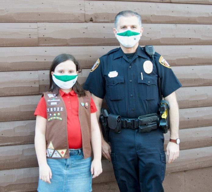 Stella Yurgiones and Officer Paul Smilley, school resource officer for Huddleston Elementary School in Peachtree City. Photo/Submitted.