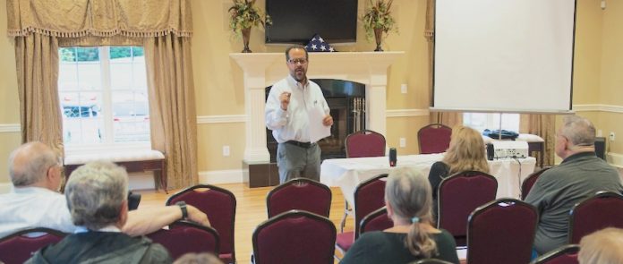 Fayette FACTOR Project Manager Michael Mumper speaks to a community gathering. Photo/Fayette FACTOR website.