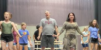 Cast members of "Mary Poppins" at Southside Theatre Guild rehearse a group scene for the upcoming play. Photo/Submitted.