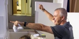 Pastor Josh Saefkow baptizes Riley Wood at Fayetteville's Flat Creek Baptist Church in August. Saefkow is being nominated for president of the Georgia Baptist Convention. [Photo/Pam Hall]