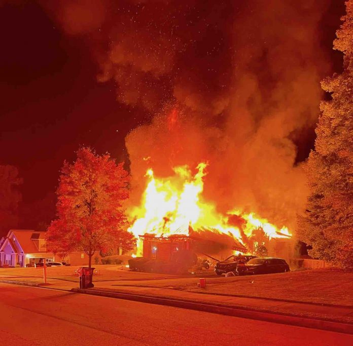 The home off Lester Road was fully engulfed in flames Thursday. No injuries were reported. Photo/Fayetteville Fire Department.