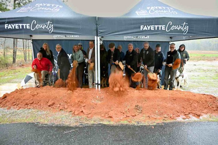 Moving dirt for the new animal shelter are (L-R) Commissioner Eric Maxwell, Commissioner Charles Oddo, Mayor Kim Learnard, Commissioner Edward Gibbons, County Manager Steven Rapson, Director Jerry Collins, Fayette Humane Society President Rick DeLoach. Photo/Fayette County.