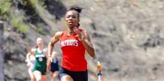 Sandy Creek High School senior Isis Simone Grant on her record-setting pace to become the fastest 800-meter female runner in the history of Georgia track records. Photos/Atlanta Track Club.