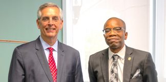 Secretary of State Brad Raffensperger (L) meets with Brian Hill, director of elections and voter registration for Fayette County. Photo/Fayette County.