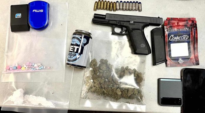 Drugs, pistol and items confiscated by deputies in drug bust. Photo/Fayette County Sheriff's Office.