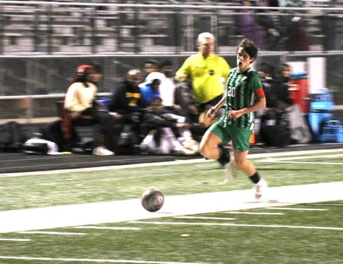 Jackson Awtry crosses ball on the way to Chiefs' victory.Photo/McIntosh Athletics.com