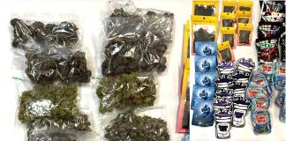 Photo shows contraband confiscated by deputies: More than 2 pounds of marijuana, more than an ounce of mushrooms, Xanax and MDMA (Ecstasy) pills, and baby bottles filled with codeine.