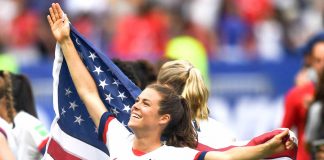 Kelley O'Hara flies the championship flag for her country. Photo/USSoccer.com