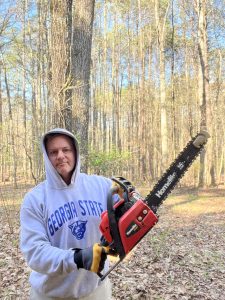 My wife's love language is "acts of service". Here I am about to make her happy by trimming up tree limbs. Photo/Joe Domaleski