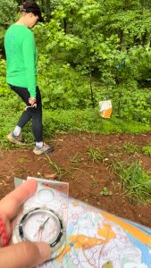 Joe and Mary Catherine approaching a control point during an orienteering meet at McIntosh Reserve on 5/19/24. Photo/Joe Domaleski