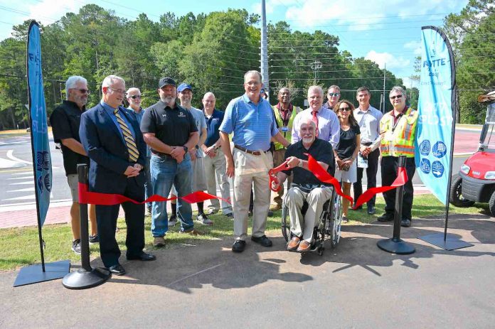 Fayette County officials commemorate the completion of a roundabout and cart path extension on Redwine Road . Photo/Fayette County.