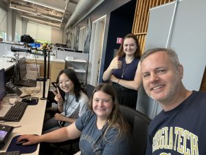 GT students working in the Buzz Card office pose for a selfie with the author. Photo/Joe Domaleski