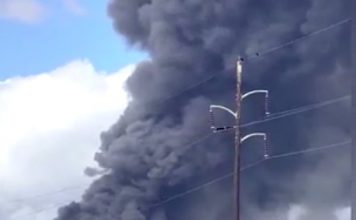 Plume of smoke from Biolab fire seen from I-20 Sunday.