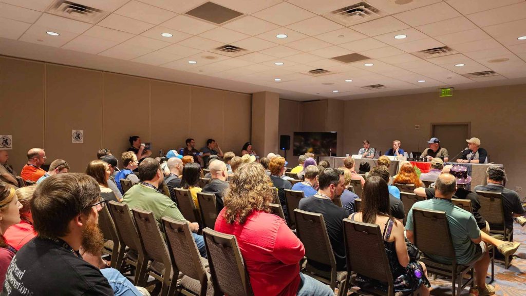 Hampocalypse - amateur (ham) radio panel at Dragon Con 2024. I was the moderator (far right seated at the table) and Mary Catherine was also a panelist (second from the left). Photo/Jonathan Sarge